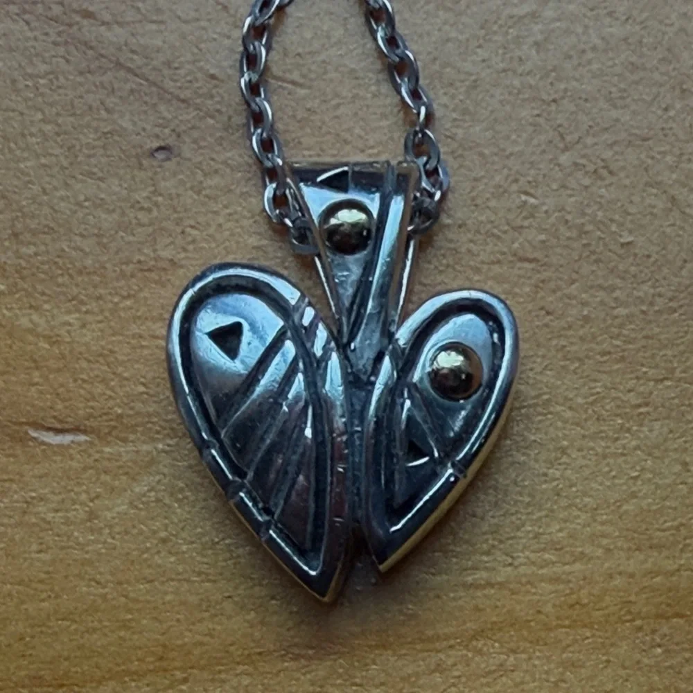 Elegant Silver and Gold Heart Pendant Necklace - Picture 6 of 6